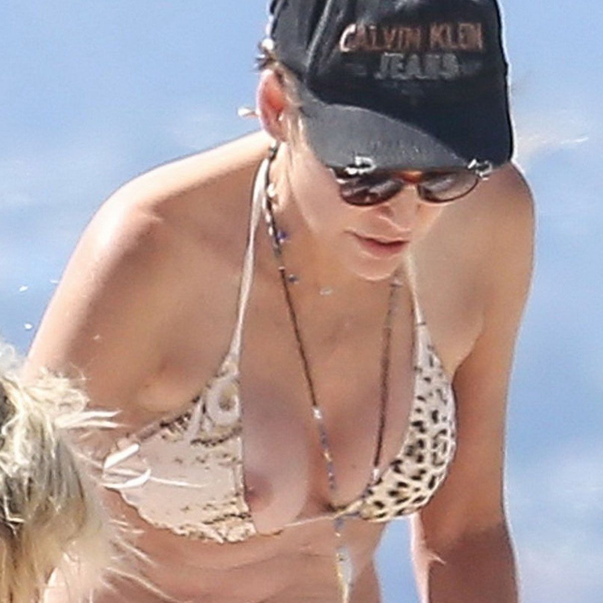 IMGBOC.COM - Sharon Stone boobs pop out of bikini nip slip on the beach in  Venice 47x HQ photos 9.jpg -