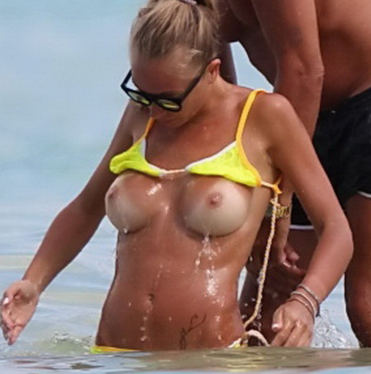 IMGBOC.COM - Laura Cremaschi boobs pop out from tiny bikini topless on the  beach in Miami 16x HQ photos 4.jpg -